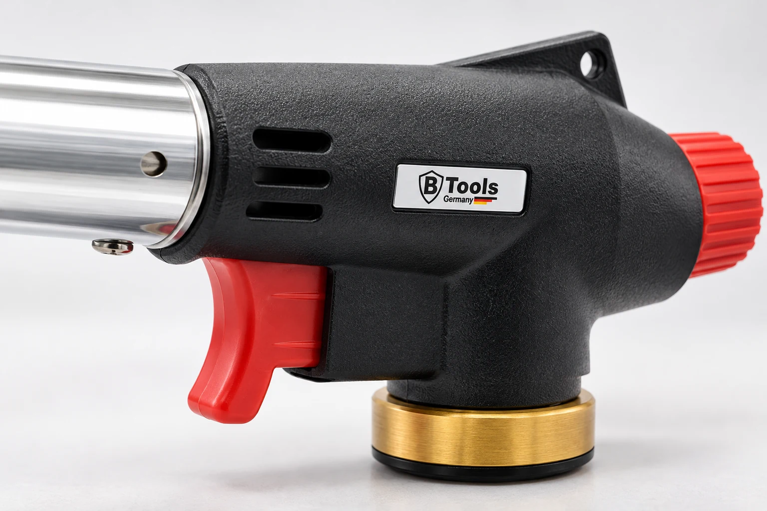Close-up van de rode ontstekingshendel en bediening op het Btools gasbranderopzetstuk